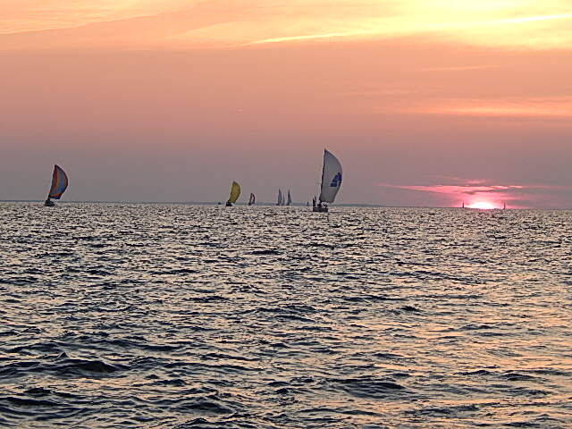 The trailing Fleet as the sun sets on the Potomac